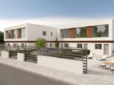 Newly built 2-bedroom gated property in Orihuela Costa with modern exterior and communal landscaped grounds